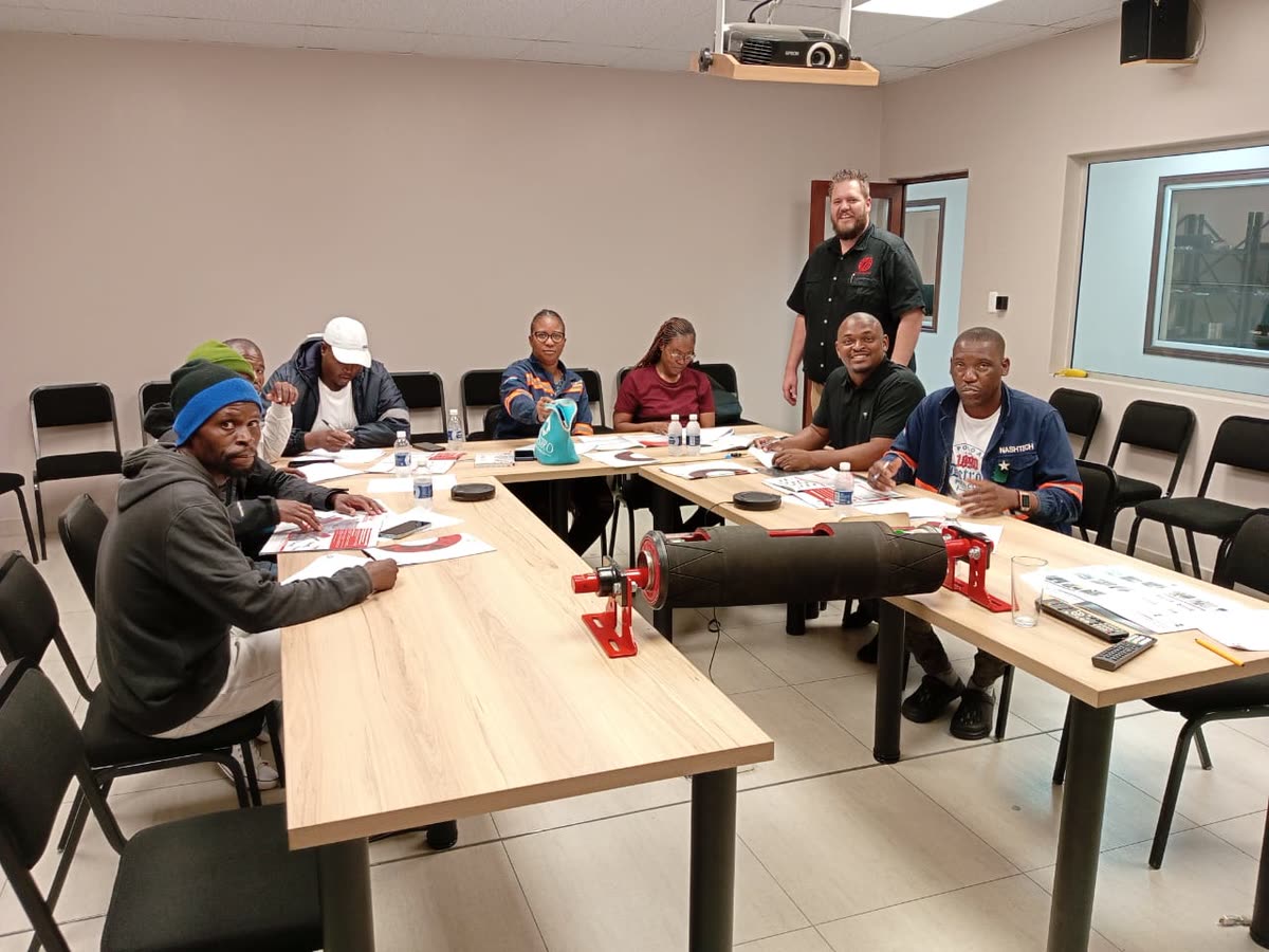 Staff in a conveyor equipment training session